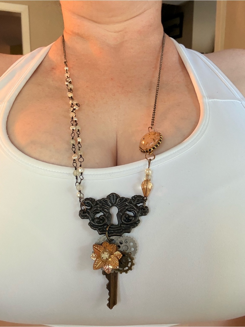 Mixed Metal Key and Gear Pendant Necklace in Gold and Bronze